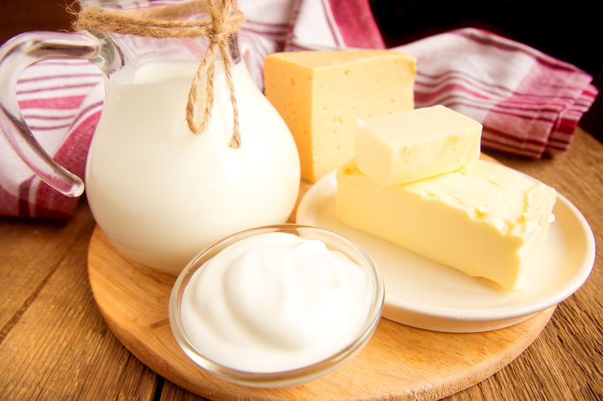 40089889 - dairy products - milk, cheese, butter, sour cream over wooden table