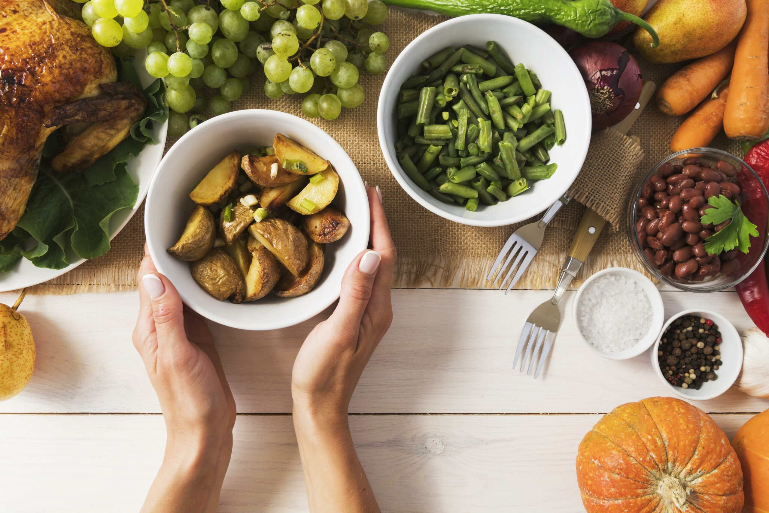 close-up-hands-holding-bowl-potatoes