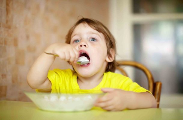 2 years child himself eats dairy  with spoon